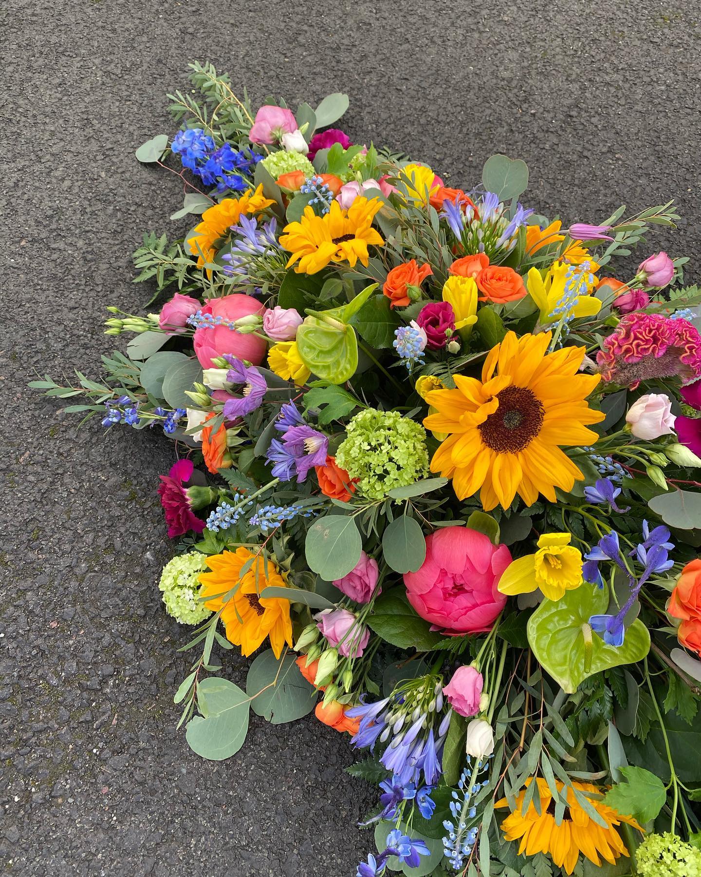 A sympathy spray hand-tied at Hilary's Floral Design studio in Abergavenny